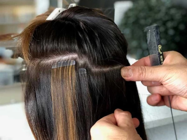 HOW TO: Fine to voluminous hair in no time with tape-in extensions